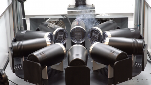 drinking tumblers arranged in a fixture for laser engraving