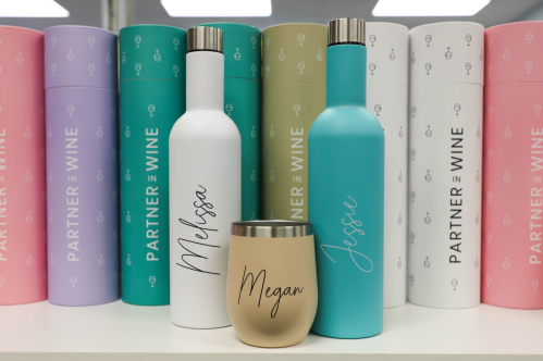 engraved drinkware standing in a line